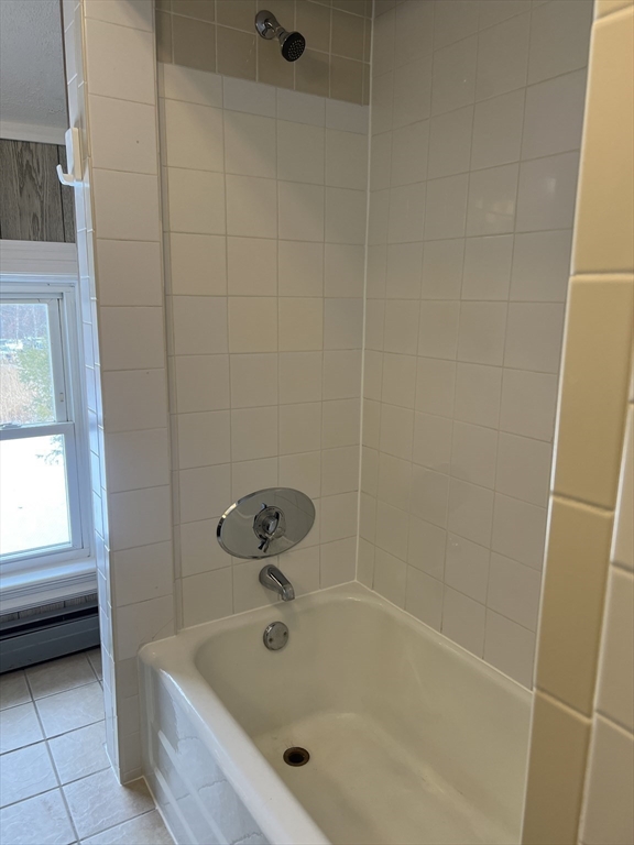 134 Bay State Road, Unit 2 Rehoboth, MA 02769 - Photo 17 of 18 a bathroom with a tub and a window