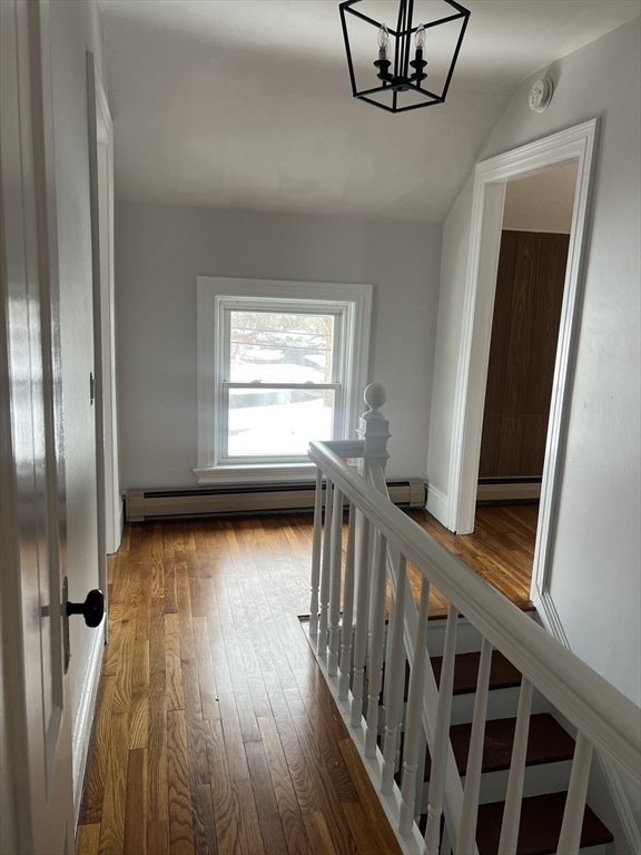134 Bay State Road, Unit 2 Rehoboth, MA 02769 - Photo 18 of 18 a view of a hallway with wooden floor and stairs