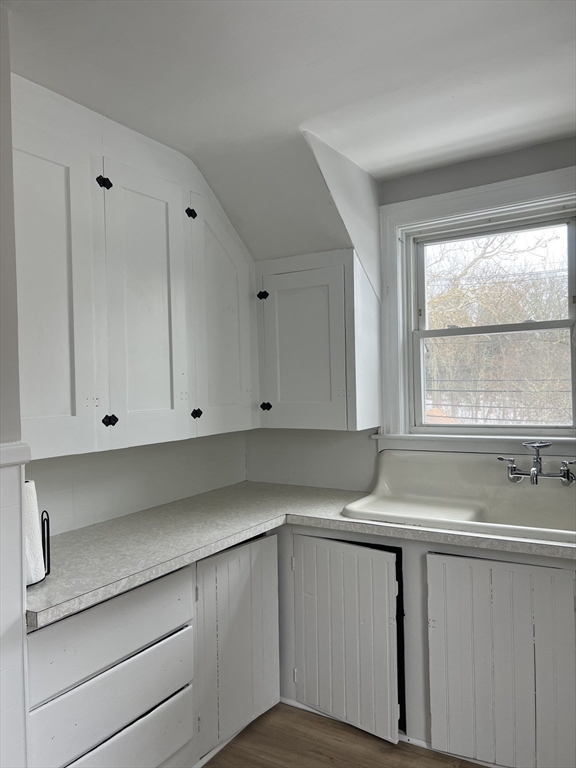 134 Bay State Road, Unit 2 Rehoboth, MA 02769 - Photo 4 of 18 a view of cabinets and window