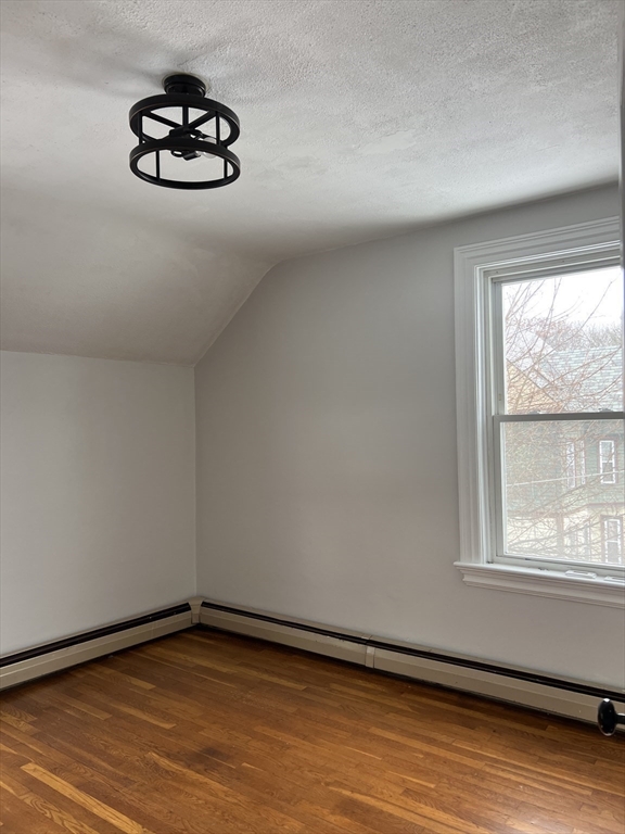 134 Bay State Road, Unit 2 Rehoboth, MA 02769 - Photo 9 of 18 a view of a room with wooden floor and window