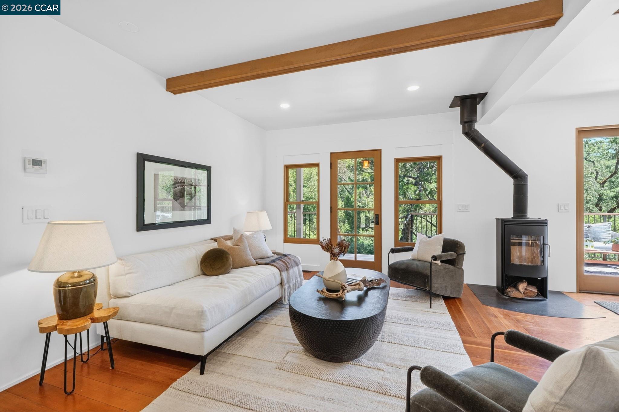4009 Redwood Road Napa, CA 94558 - Photo 34 of 91 a living room with furniture and a large window