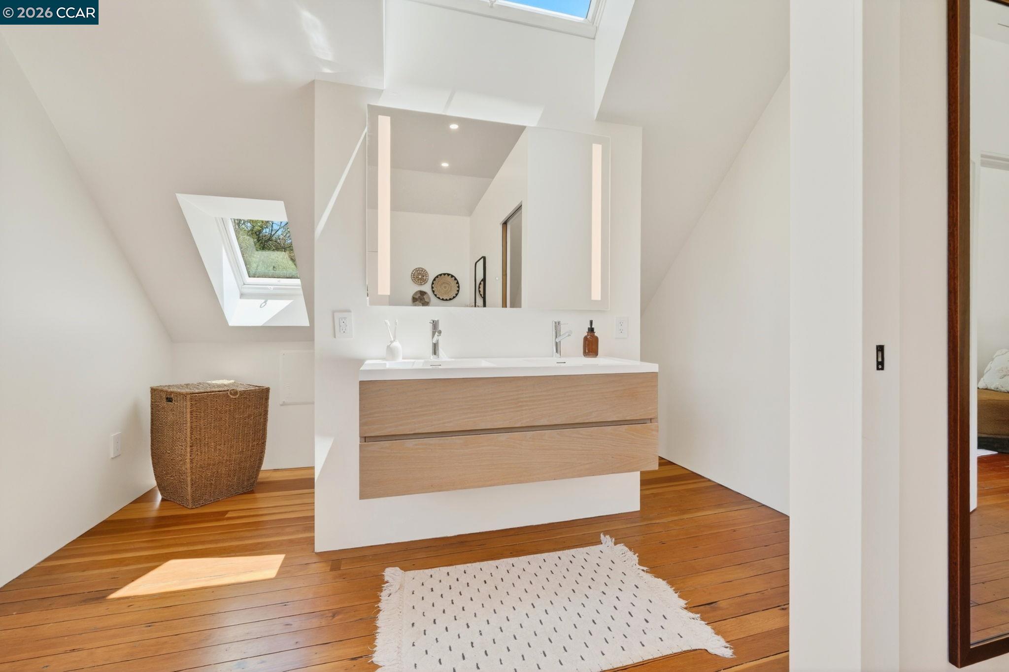 4009 Redwood Road Napa, CA 94558 - Photo 58 of 91 a bathroom with a sink and a mirror