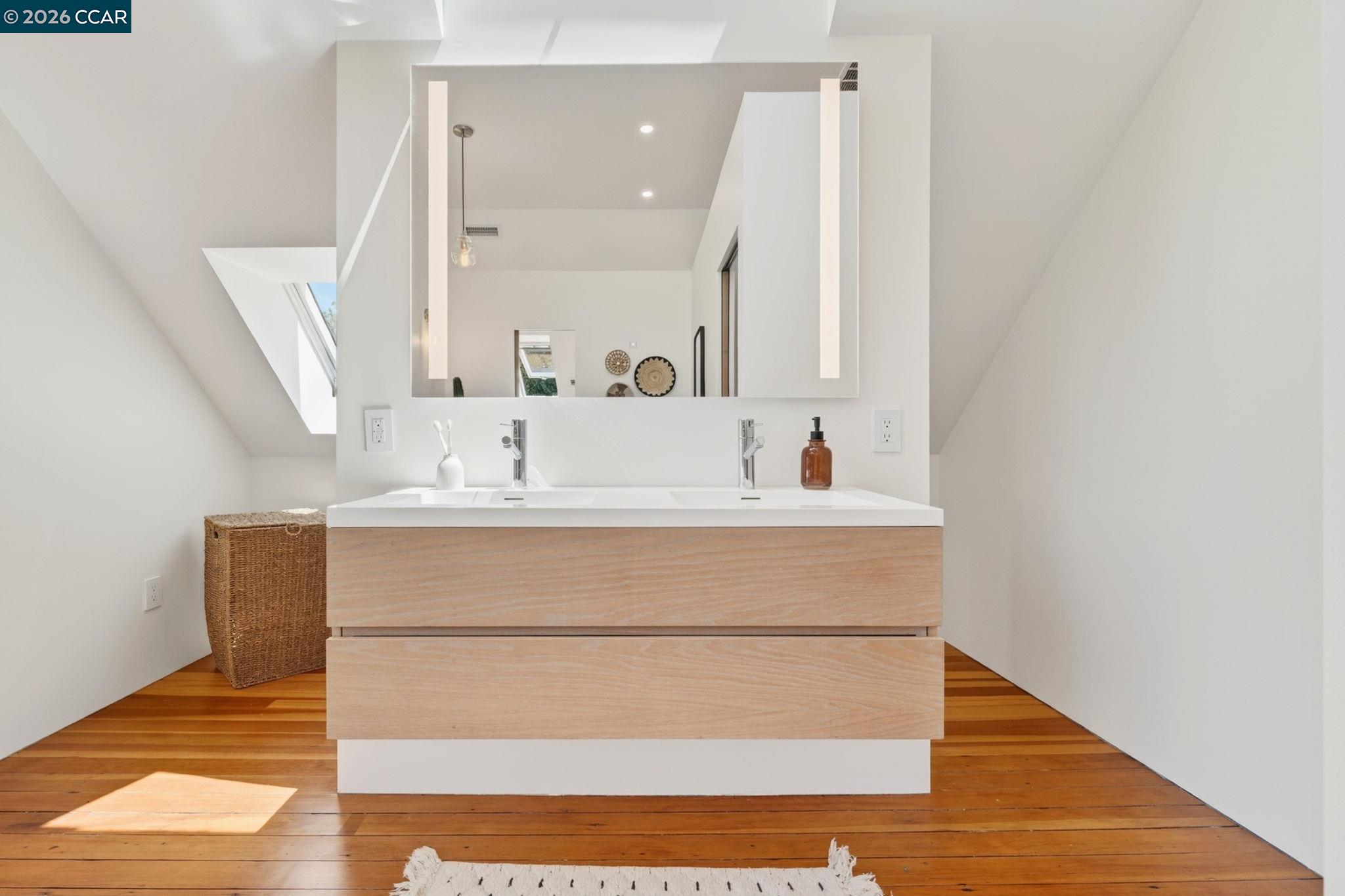 4009 Redwood Road Napa, CA 94558 - Photo 59 of 91 a bathroom with a sink and a mirror
