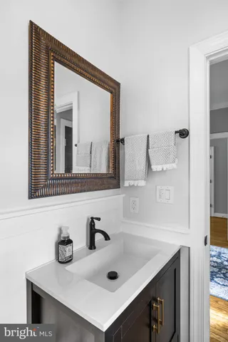 a view of a livingroom with a ceiling fan and window