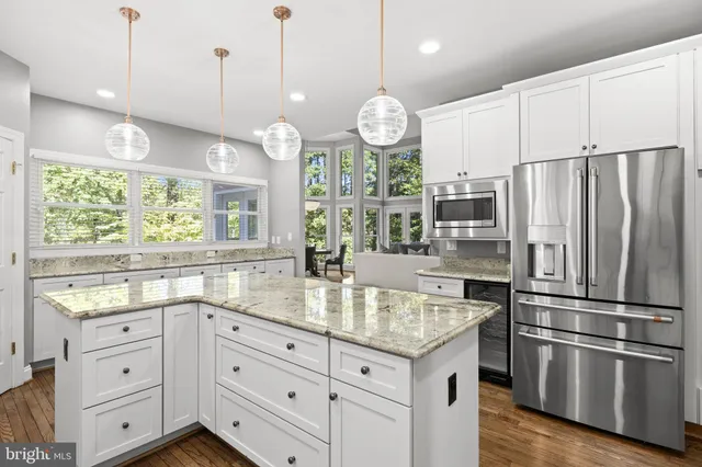 a view of a park that has large trees