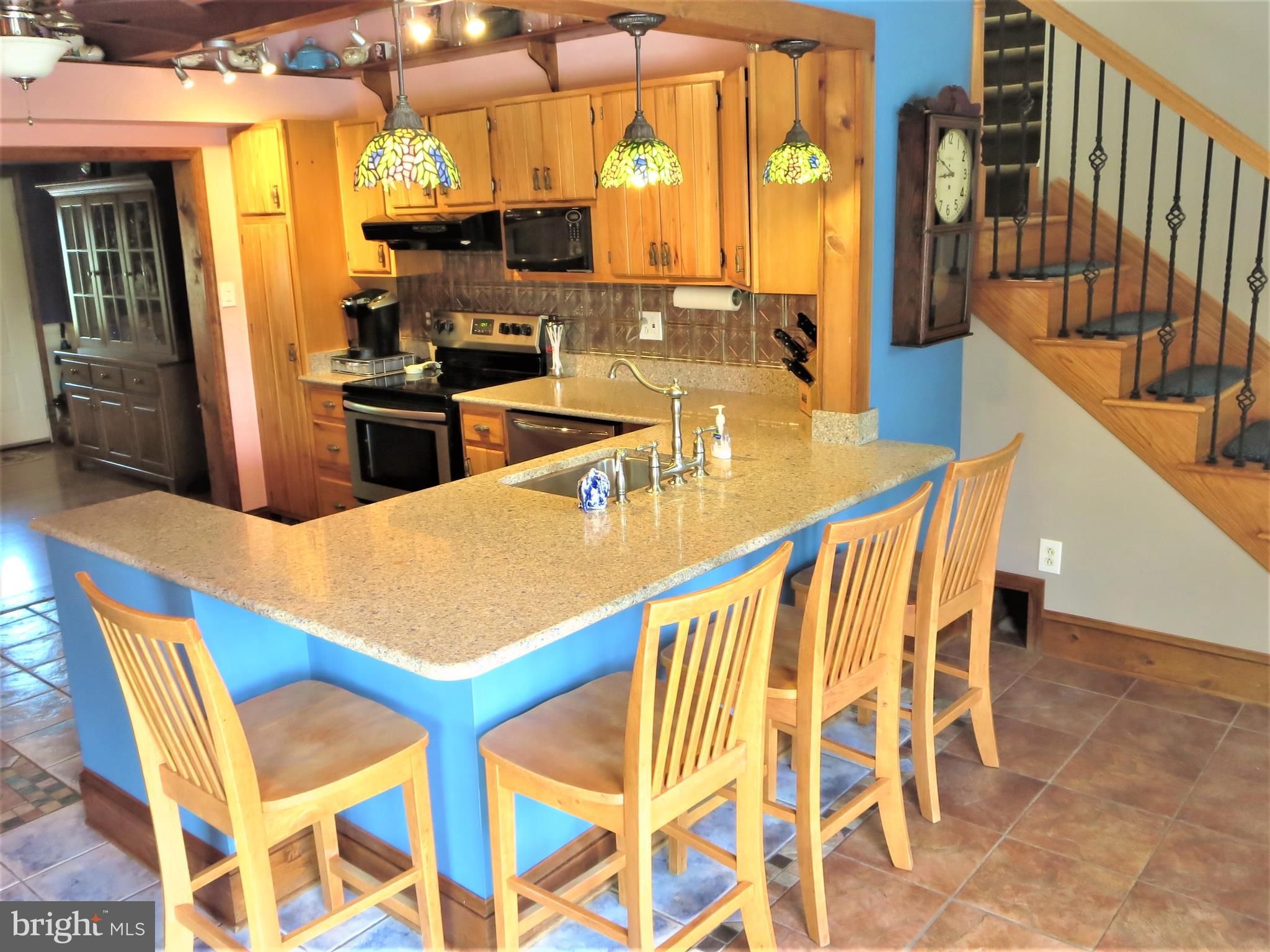 122 Andover Road Fairless Hills, PA 19030 - Photo 12 of 33 Breakfast bar w/ quartz counter open to great room