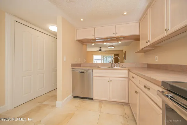 a view of a balcony with chair and wooden floor