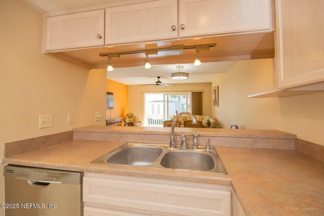 a view of a swimming pool with an ocean view