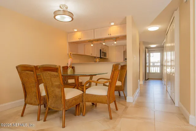 a view of a balcony with two chairs