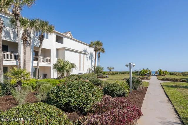 a view of a building with a swimming pool