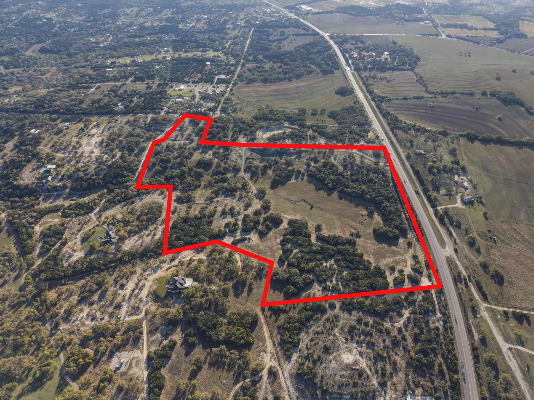 7890 Highway 290 Dripping Springs, TX 78620 - Photo 14 of 33 Overview of rural landscape featuring property parcel outlined