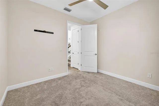 a view of an empty walk in closet