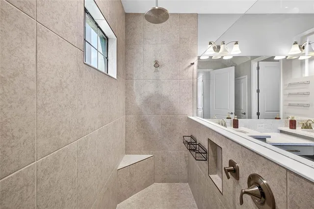 a view of a swimming pool with a table and chairs