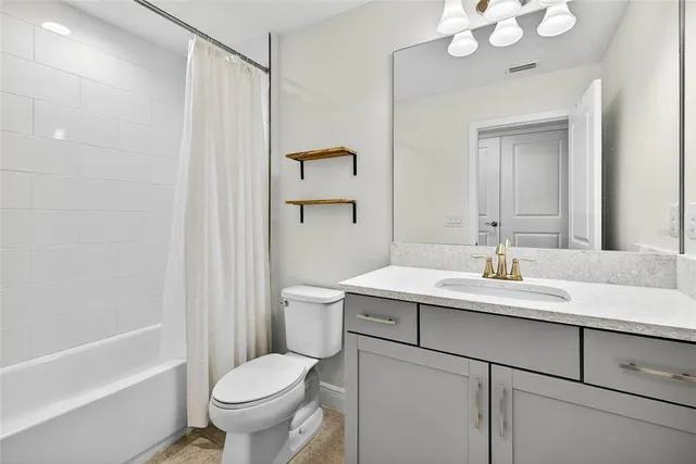 a view of a wrought iron fences in front of house