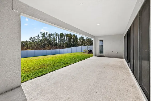 a view of a swimming pool with an ocean view