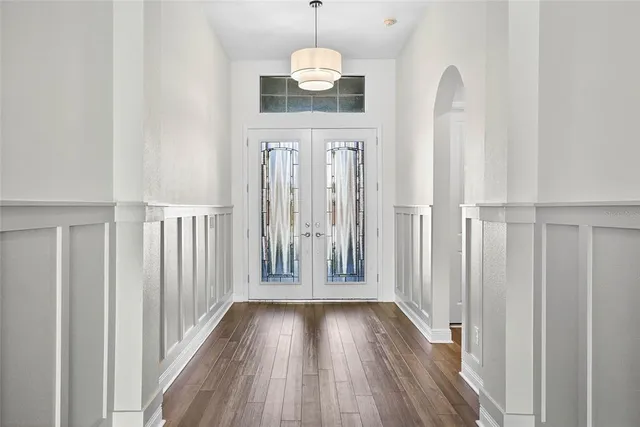 a view of a kitchen with a sink and microwave