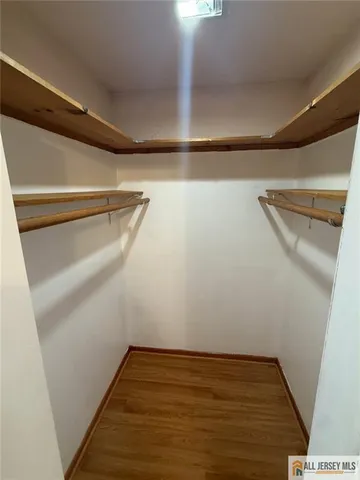 a view of a room with racks on the wall