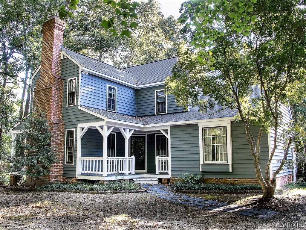 13301 Queensgate Road Midlothian, VA 23114 - Photo 1 of 20 a front view of a house with garden