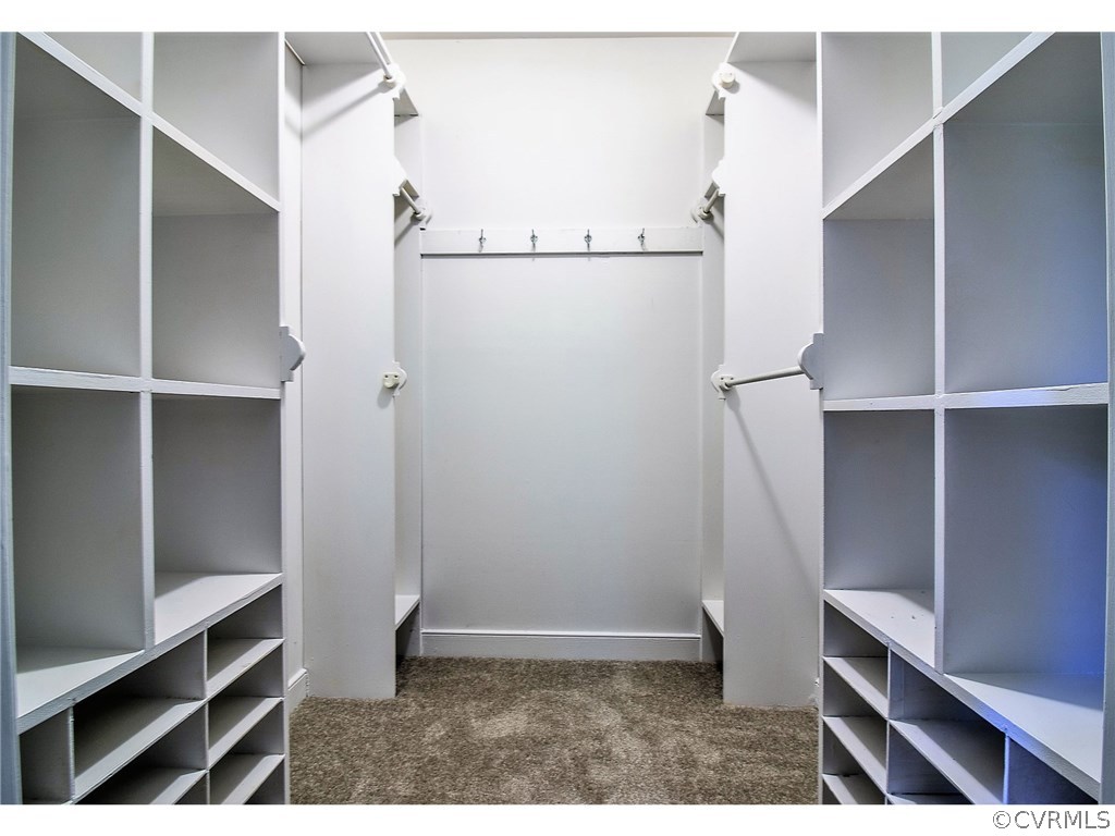 13301 Queensgate Road Midlothian, VA 23114 - Photo 11 of 20 a view of walk in closet with empty racks