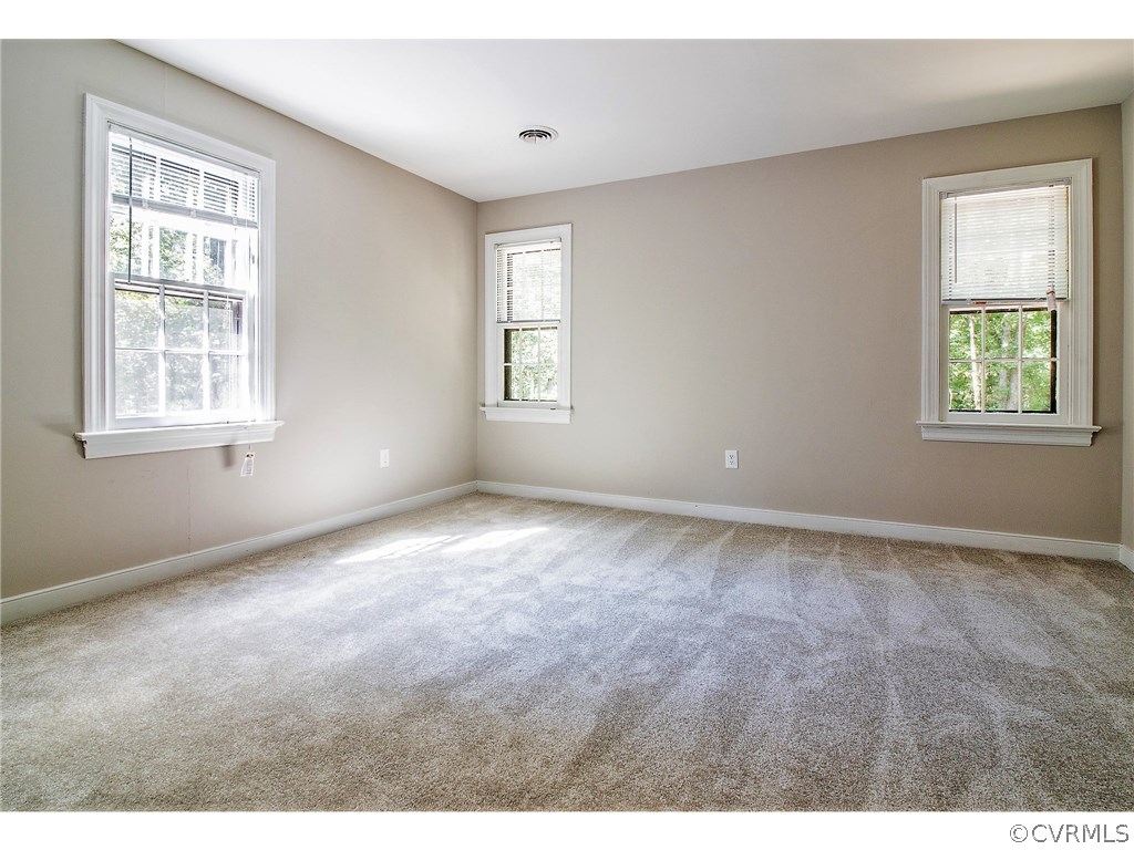 13301 Queensgate Road Midlothian, VA 23114 - Photo 14 of 20 a view of an empty room with a window