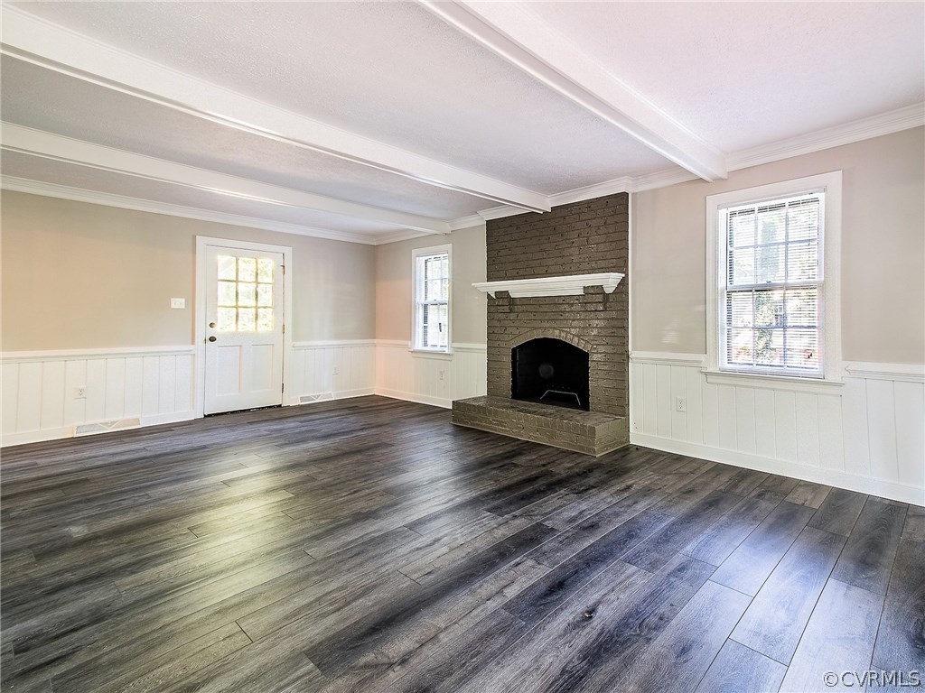 13301 Queensgate Road Midlothian, VA 23114 - Photo 8 of 20 an empty room with wooden floor fireplace and windows