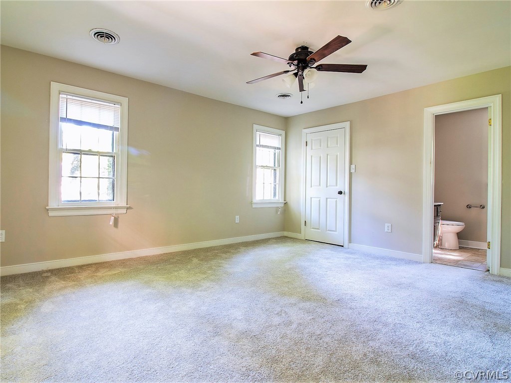 13301 Queensgate Road Midlothian, VA 23114 - Photo 10 of 20 a view of an empty room with a window
