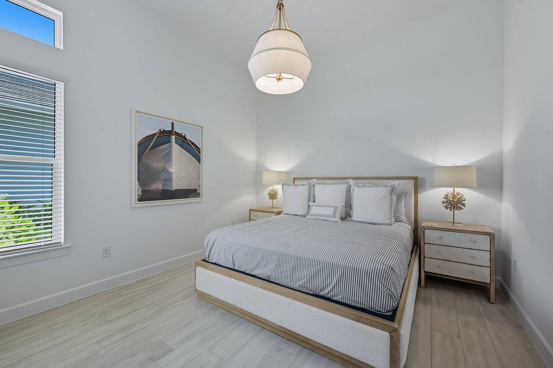 15326 Turin Drive Naples, FL 34114 - Photo 16 of 50 a bedroom with a bed and a window