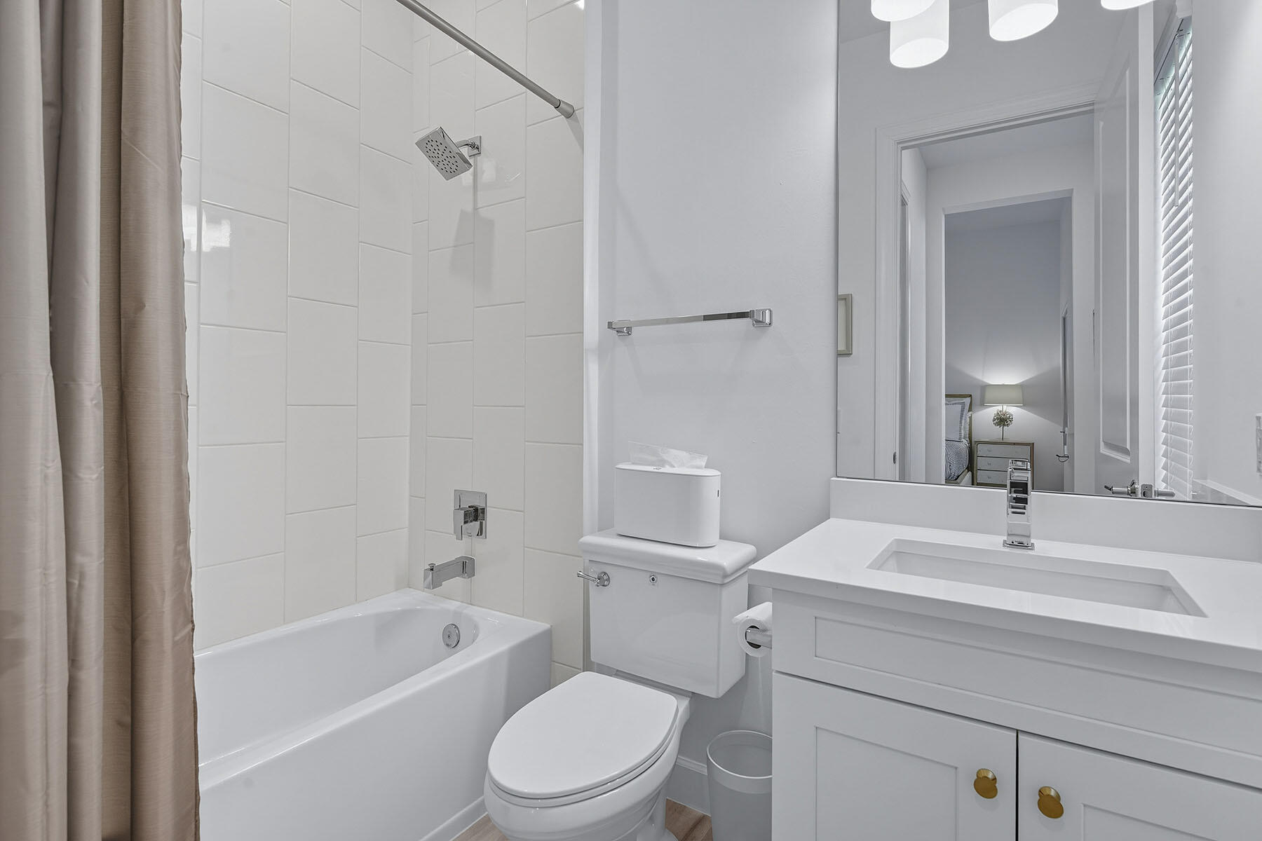 15326 Turin Drive Naples, FL 34114 - Photo 17 of 50 a bathroom with a sink a toilet and shower