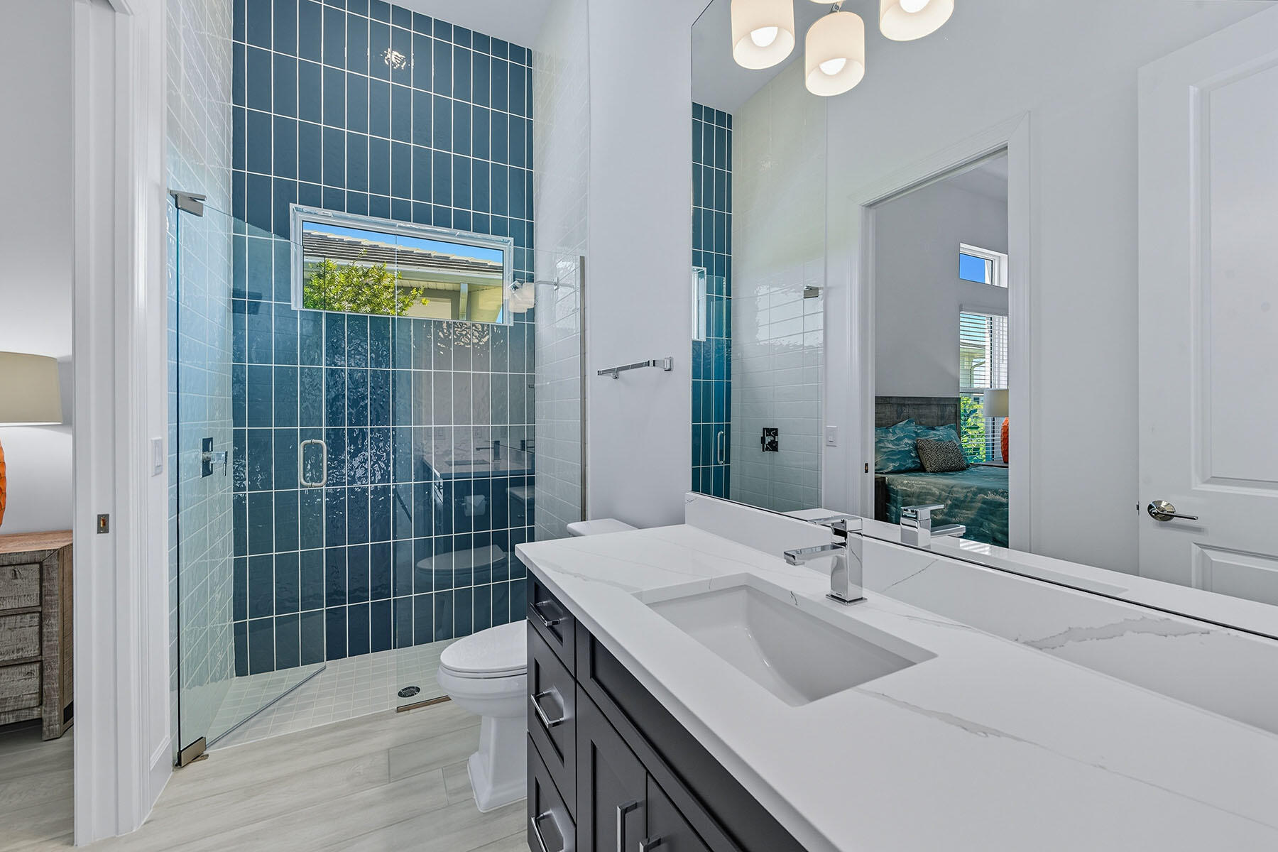 15326 Turin Drive Naples, FL 34114 - Photo 19 of 50 a bathroom with a sink and a shower