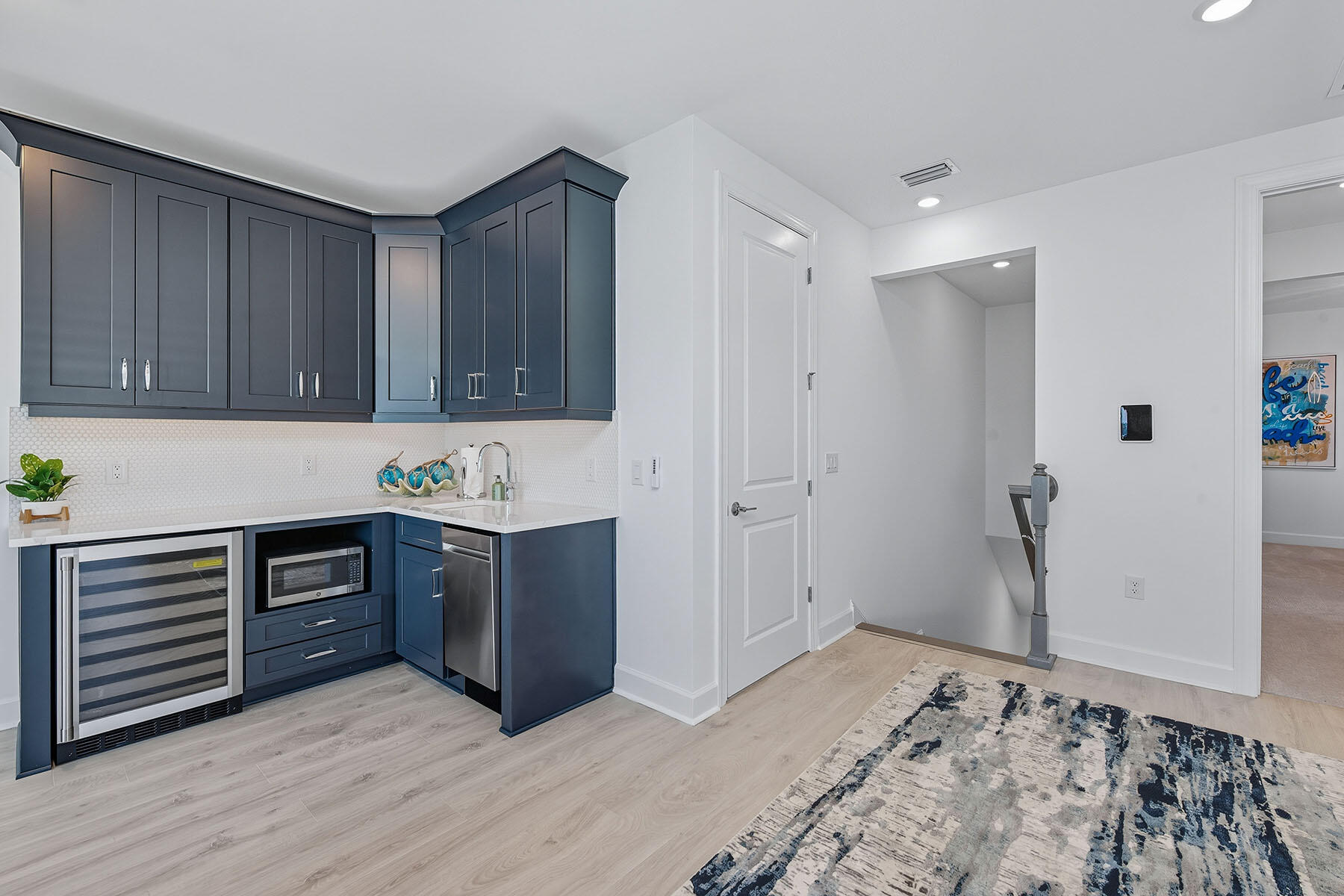 15326 Turin Drive Naples, FL 34114 - Photo 22 of 50 a kitchen with stainless steel appliances granite countertop a refrigerator and a stove top oven