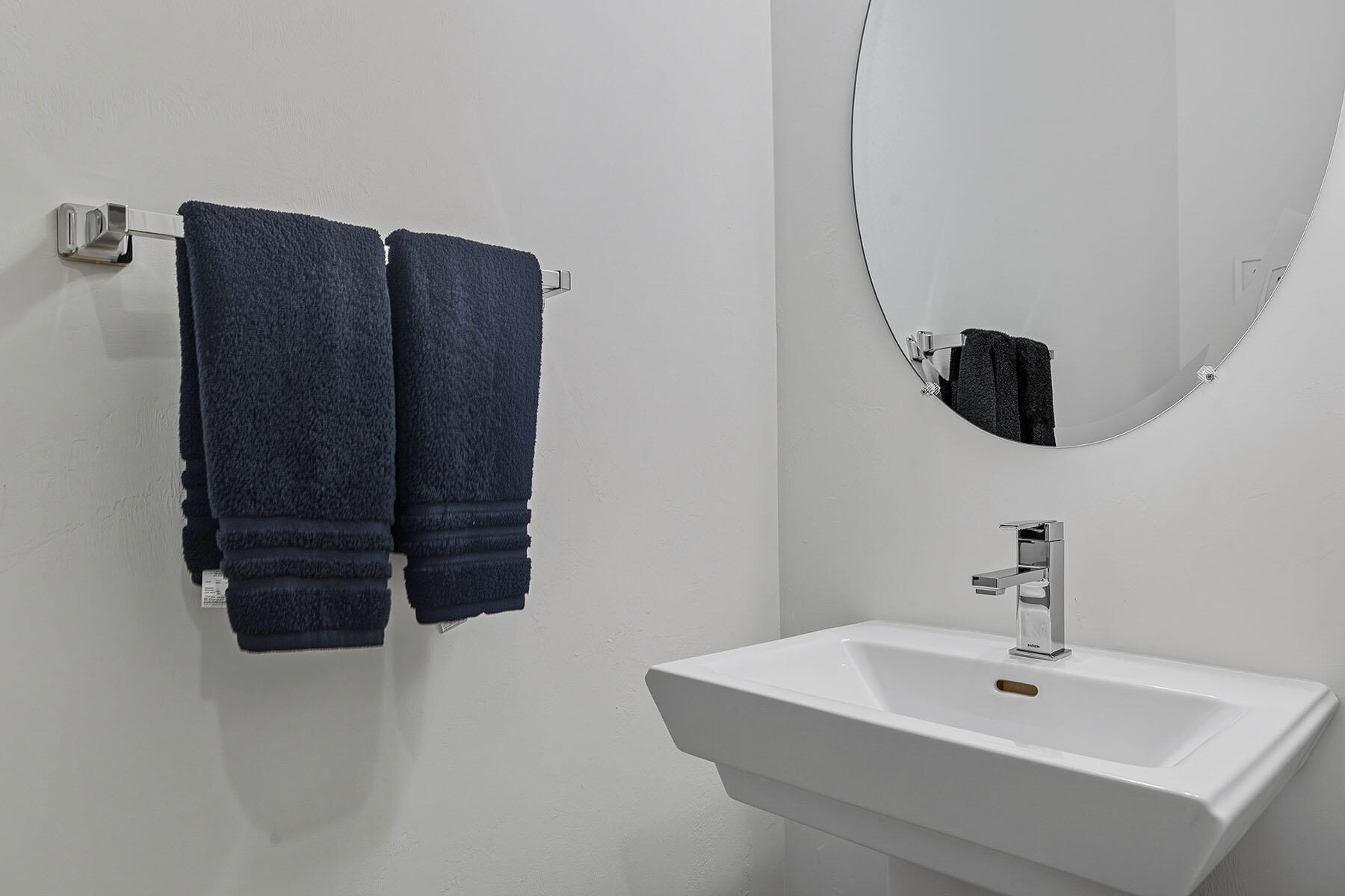 15326 Turin Drive Naples, FL 34114 - Photo 28 of 50 a bathroom with a sink and a mirror