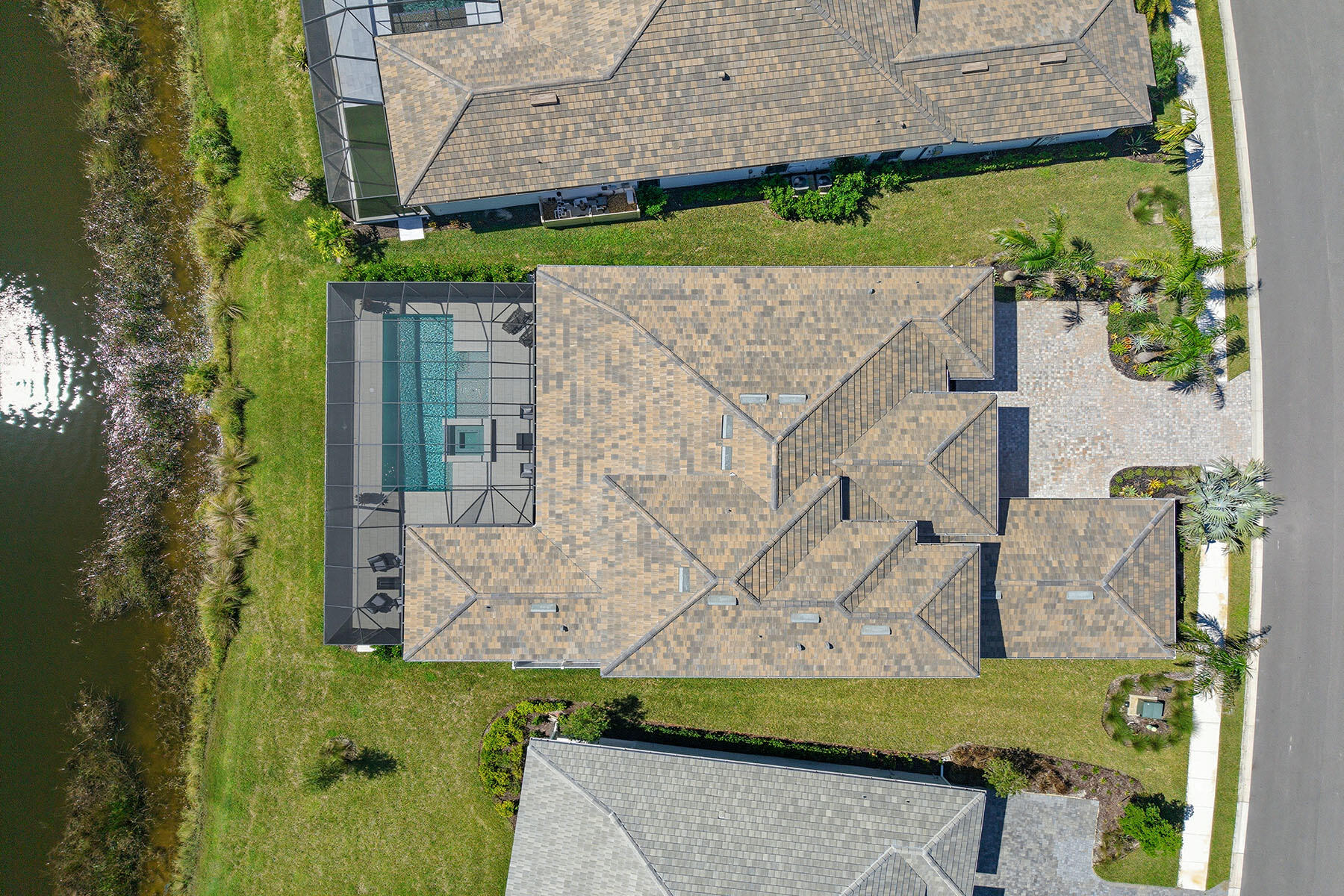 15326 Turin Drive Naples, FL 34114 - Photo 40 of 50 aerial view of a house with a yard