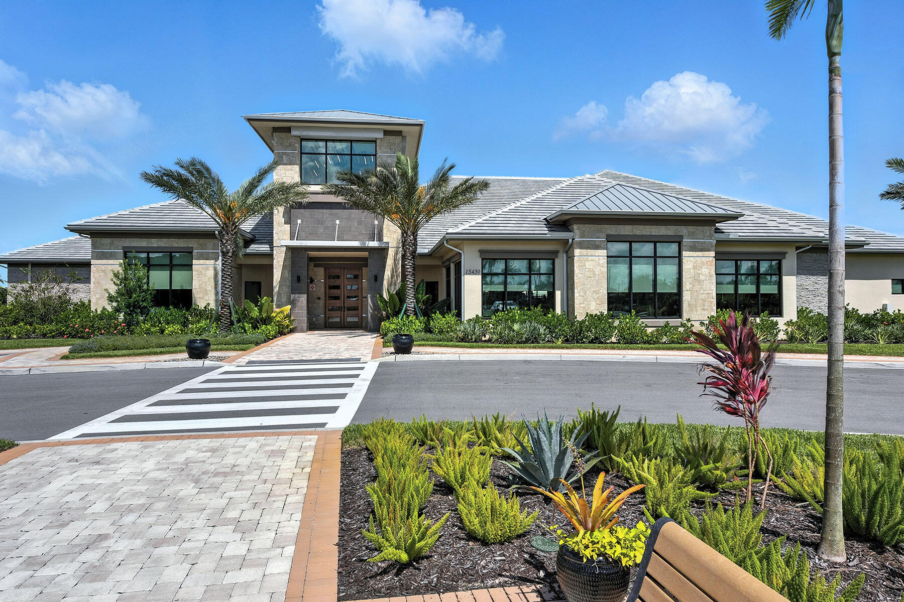 15326 Turin Drive Naples, FL 34114 - Photo 46 of 50 a front view of a house with garden