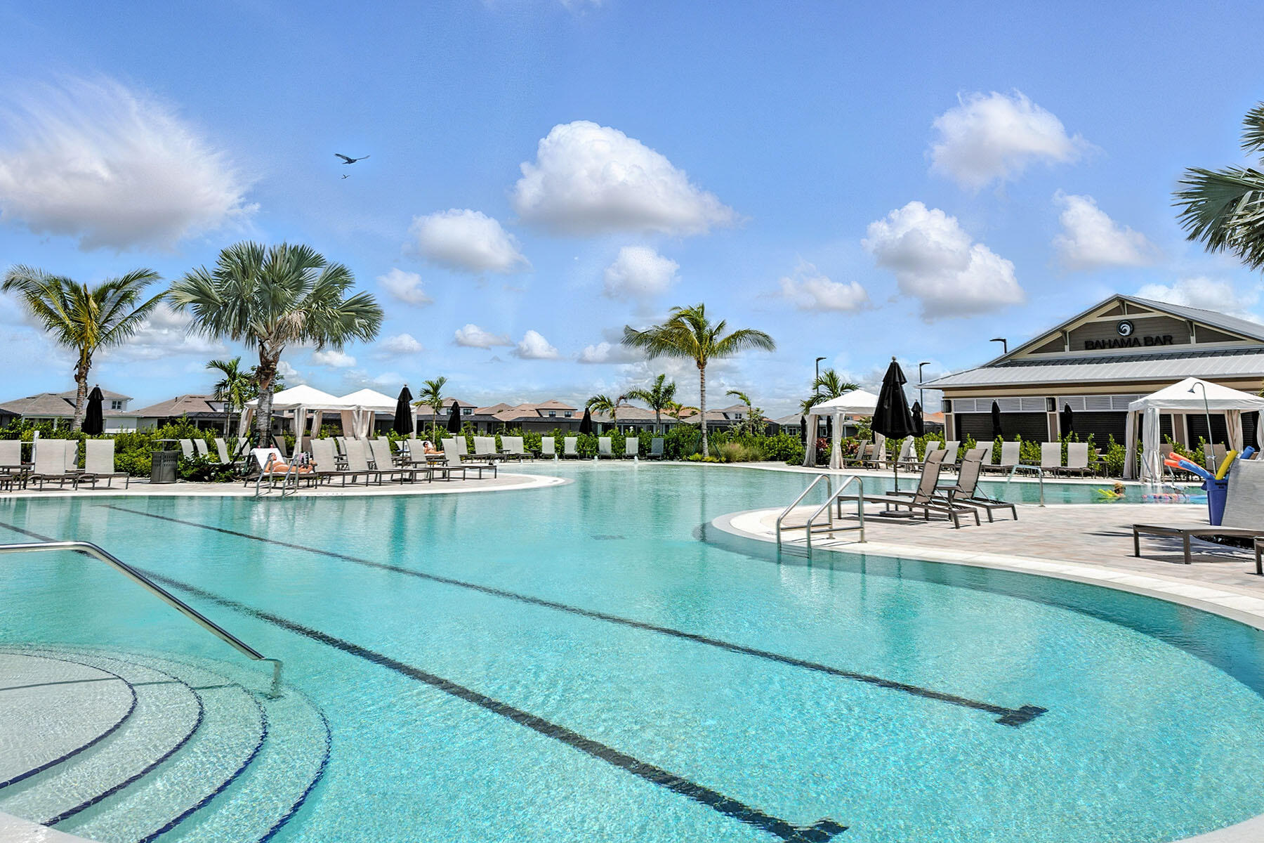 15326 Turin Drive Naples, FL 34114 - Photo 48 of 50 a view of a swimming pool with outdoor seating