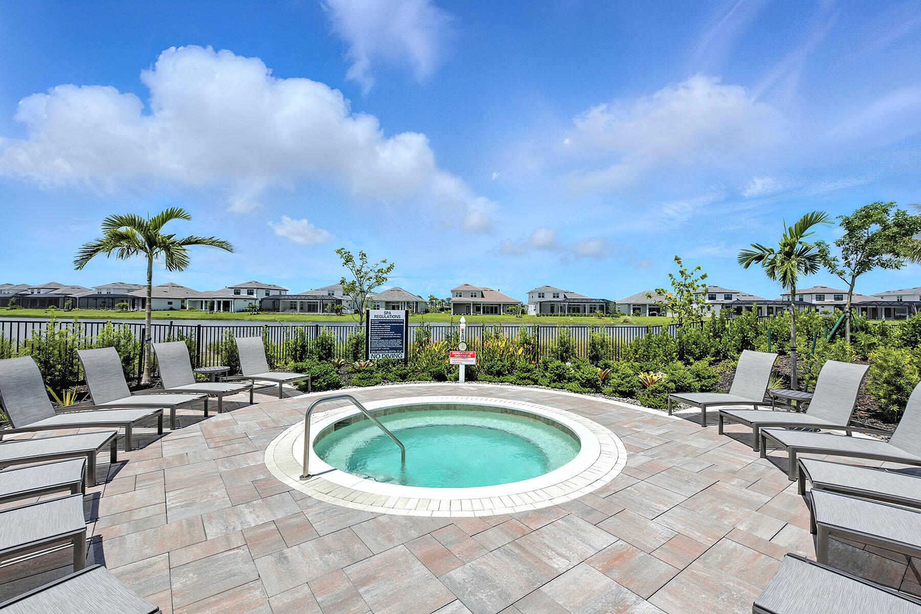 15326 Turin Drive Naples, FL 34114 - Photo 49 of 50 a view of a swimming pool and lounge chairs