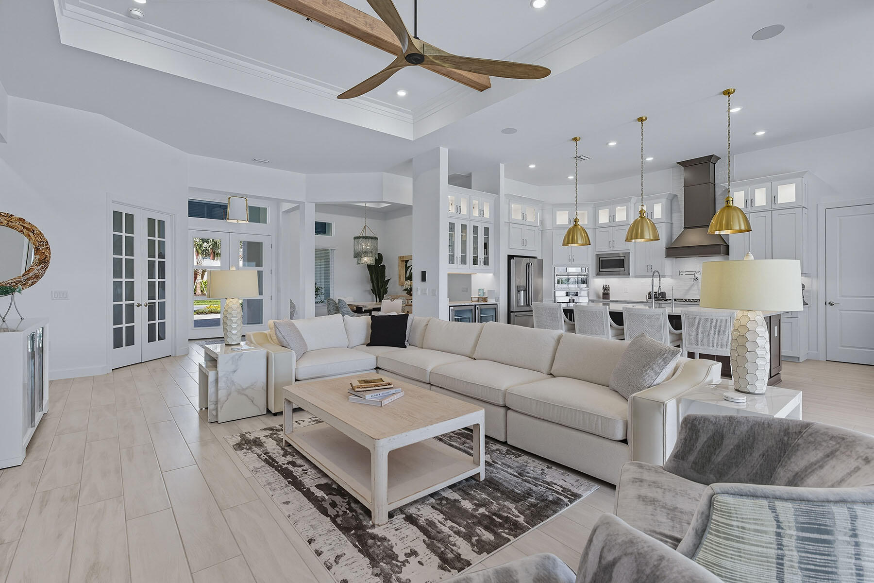 15326 Turin Drive Naples, FL 34114 - Photo 6 of 50 a living room with furniture and a wooden floor