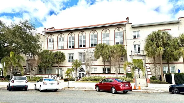 a car parked in front of a building