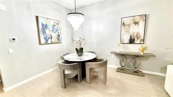 a view of a dining room with furniture