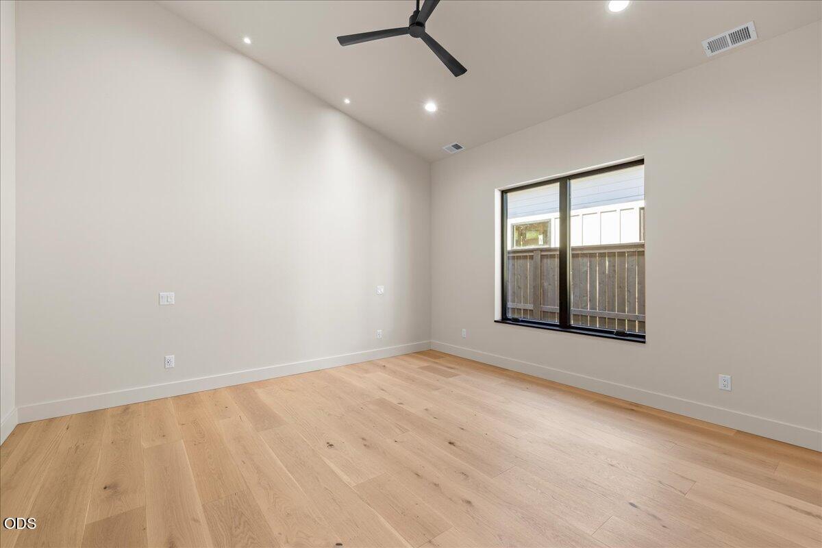 391 Clinton Street Ashland, OR 97520 - Photo 22 of 41 wooden floor in an empty room with a window