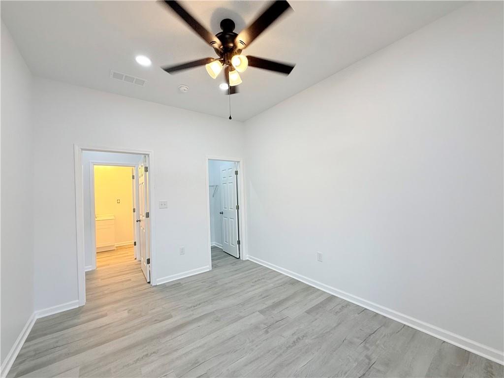 44 Dew Lk Court Grayson, GA 30017 - Photo 10 of 16 wooden floor in an empty room