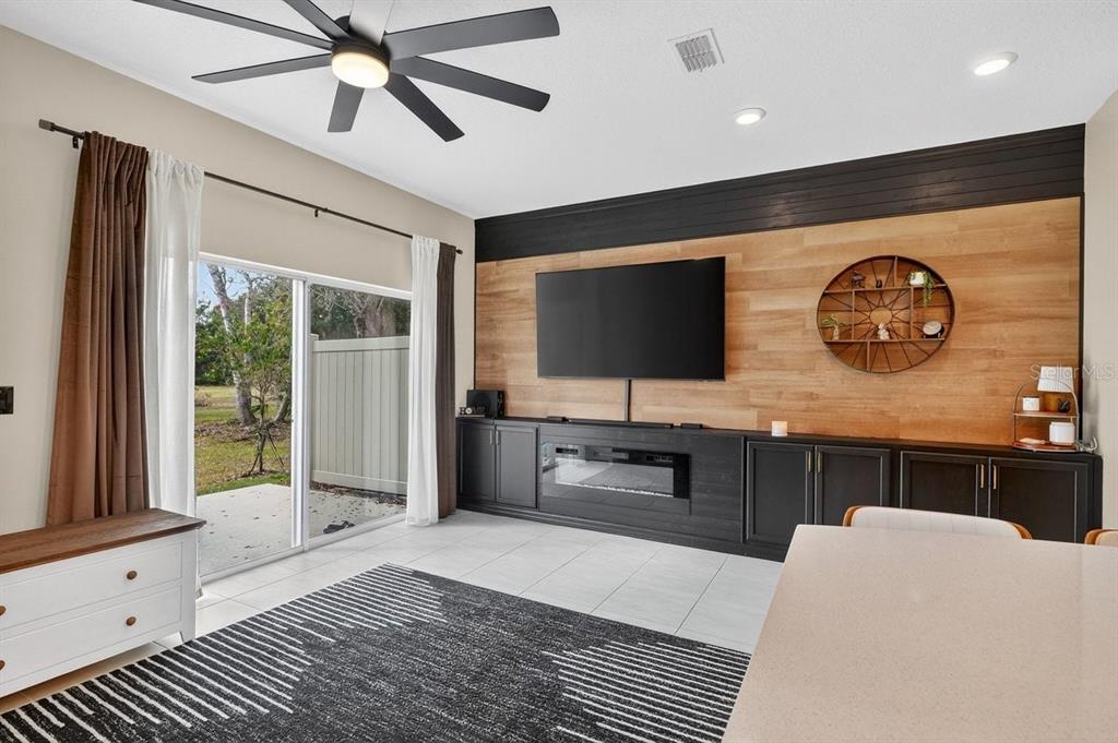 350 River Front Way Edgewater, FL 32141 - Photo 15 of 46 a bedroom with furniture and a large mirror