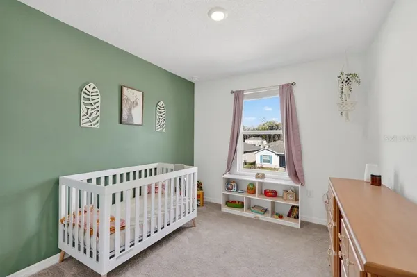 a house view with a backyard space