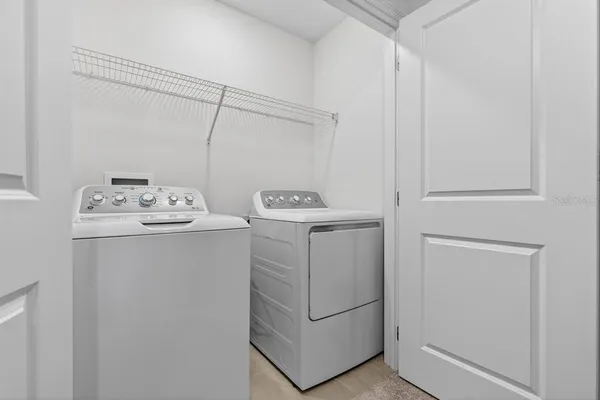 a view of swimming pool with outdoor seating