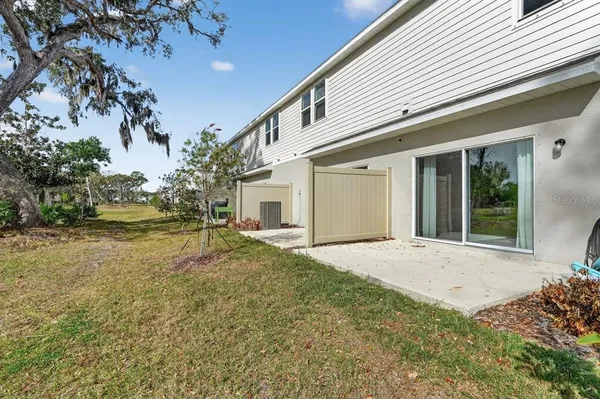 a view of a house with backyard