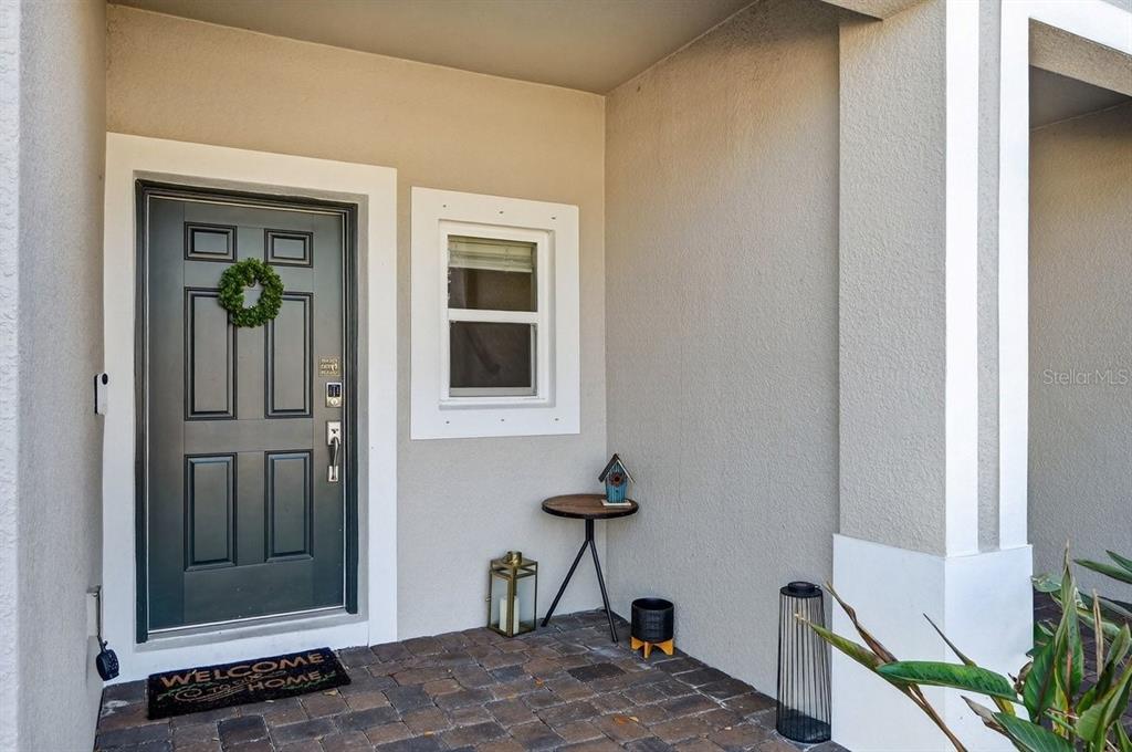 350 River Front Way Edgewater, FL 32141 - Photo 5 of 46 a view of a livingroom with a door and wooden floor