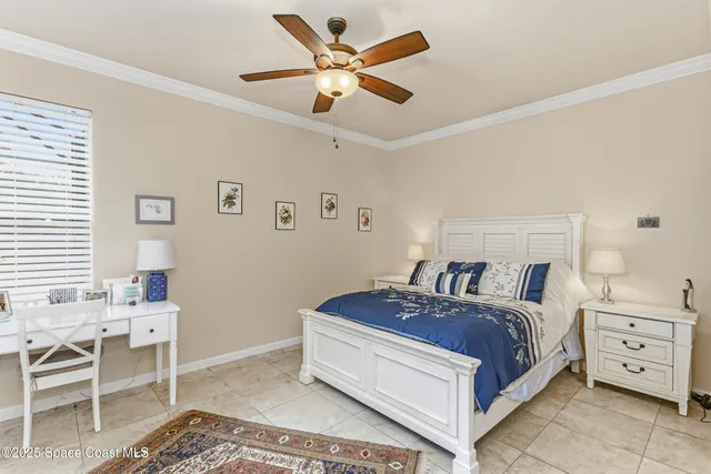 a bedroom with a bed and a table in it