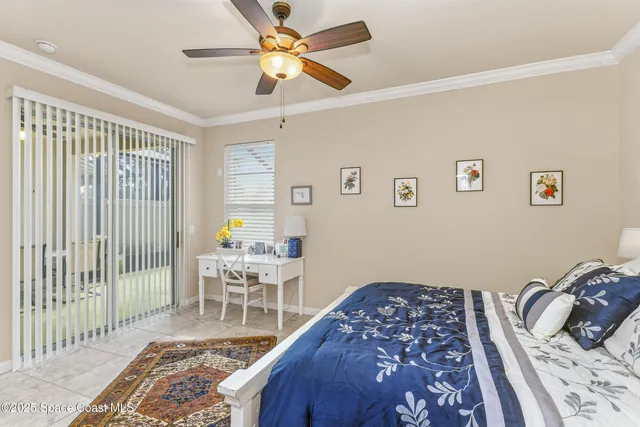 a bedroom with furniture and a window
