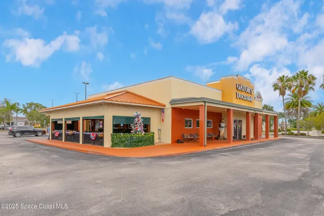 a front view of a building with street view