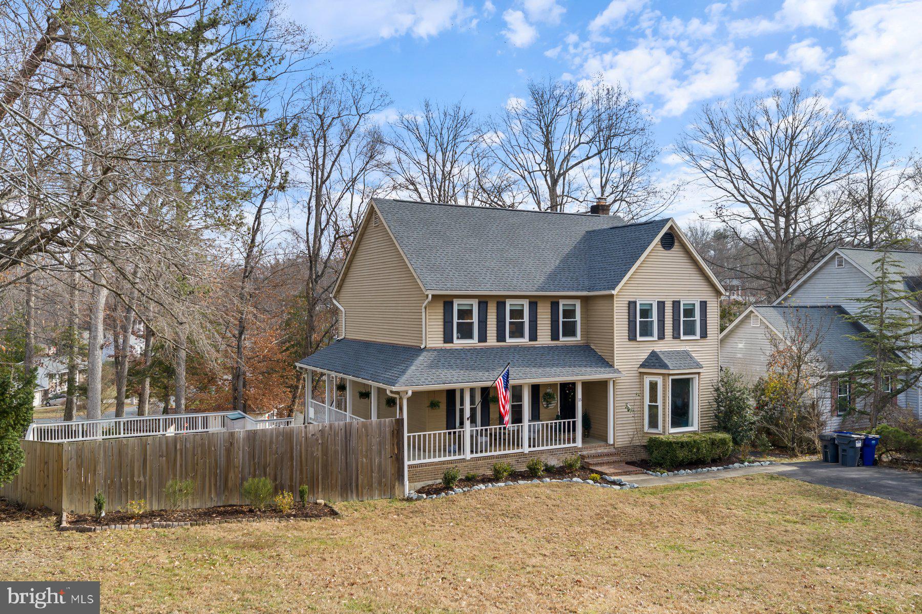 15 Tarleton Way Stafford, VA 22554 - Photo 13 of 74 a front view of a house with a yard covered in snow