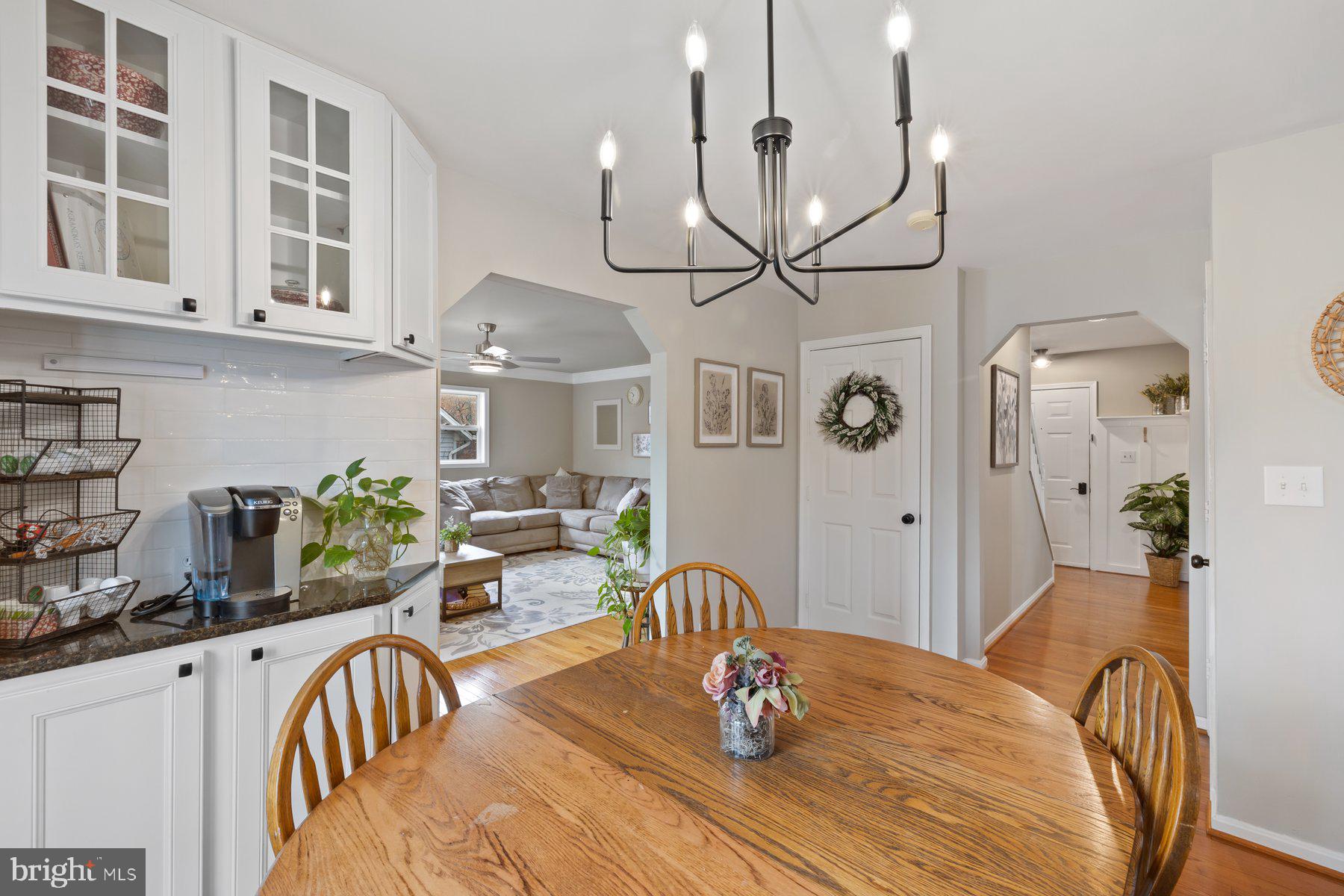 15 Tarleton Way Stafford, VA 22554 - Photo 34 of 74 a view of a dining room with furniture a chandelier and wooden floor